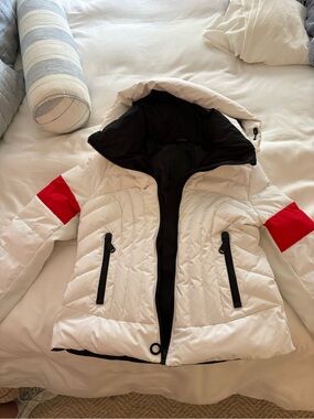 Goldbergh White Ski Jacket with Red Sleeve Panels